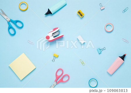 Set of stationery for work and study on blue background. Back to school. Top view, flat lay, copy space Set of stationery for work and study on blue background. Back to school. Top view, flat lay, copy space 109863813