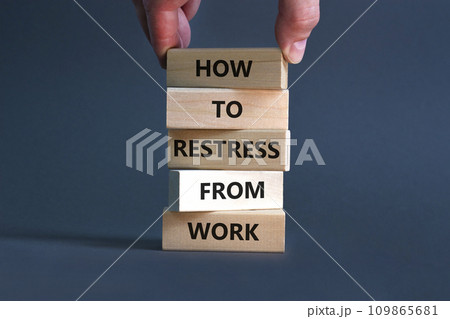 Restress from work symbol. Concept words How to restress from work on wooden blocks. Doctor hand. Beautiful grey background. Psychological business and restress from work concept. Copy space. Restress from work symbol. Concept words How to restress from work on wooden blocks. Doctor hand. Beautiful grey background. Psychological business and restress from work concept. Copy space. 109865681