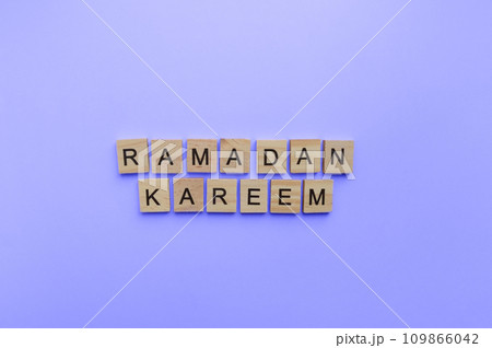 March 22 - April 21, Ramadan, a minimalistic banner with an inscription in wooden letters March 22 - April 21, Ramadan, a minimalistic banner with an inscription in wooden letters 109866042