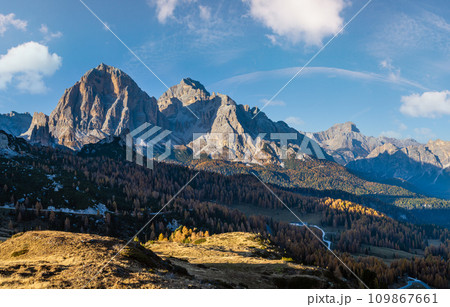Mountain sunny evening peaceful view from Giau Pass. 109867661