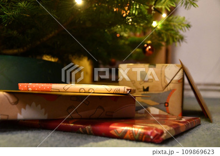 Beautifully wrapped gifts under a Christmas tree in Germany 109869623