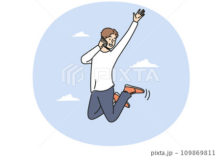 Overjoyed man jump in air talk on cellphone 109869811