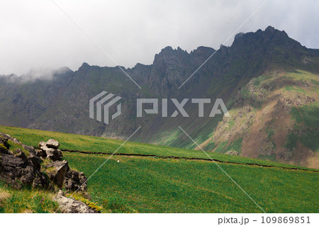 Landscape high mountains in dense fog tops of mountains in clouds North Caucasus Elbrus Landscape high mountains in dense fog tops of mountains in clouds North Caucasus Elbrus 109869851