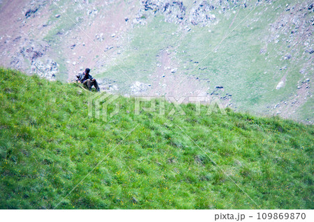 Landscape high mountains in dense fog tops of mountains in clouds North Caucasus Elbrus 109869870