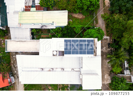 Solar panels installed on private house, drone view. 109877255