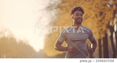 An athletic African-American man is jogging in the park. AI generated. 109883508