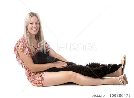 standard poodle and woman standard poodle and woman 109886475
