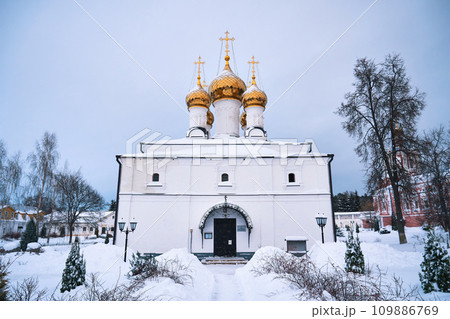 Front view of Russian white Orthodox church in winter Front view of Russian white Orthodox church in winter 109886769