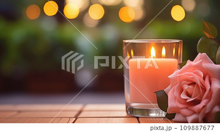 AI-generated content. A burning candle and rose flowers against the background of a garden. Banner with copy space. Self care and aromatherapy concept. AI-generated content. A burning candle and rose flowers against the background of a garden. Banner with copy space. Self care and aromatherapy concept. 109887677