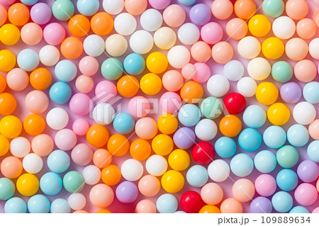 Cute plastic beads and buttons abstract background in pastel colors Cute plastic beads and buttons abstract background in pastel colors 109889634