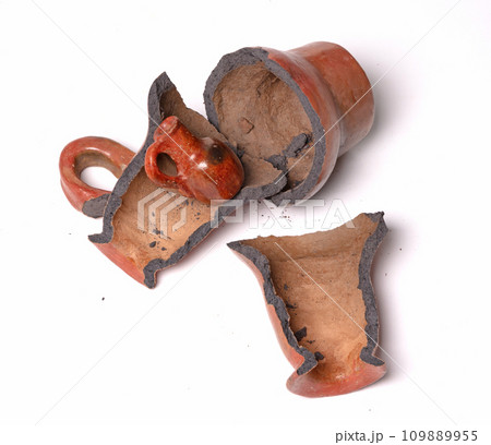 Old brown pottery, isolated on white Old brown pottery, isolated on white 109889955