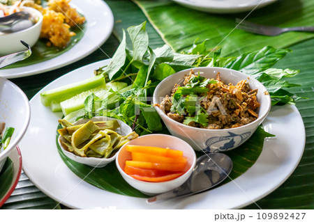 Spicy minced fish salad in dish. Thai food Spicy minced fish salad in dish. Thai food 109892427