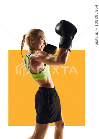 Young muscular woman with fit strong body, boxing athlete in motion, practicing over white background with yellow element. Poster 109893564