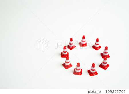 Circle of traffic cones. Localize the danger. Safety. Life and health insurance. Protection of property and business. Reliable data security system. Internet and network technologies. 109893703