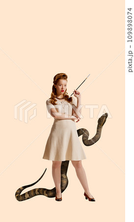 Contemporary art collage. Calm and confident woman dressed retro fashion dress with cigarette and behind he big snake against peach color background. 109898074