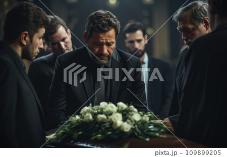 Death, funeral and family touching coffin in a church, sad and unhappy while gathering to say farewell. Church service casket and sad man and woman looking upset while greeting, goodbye and rip Death, funeral and family touching coffin in a church, sad and unhappy while gathering to say farewell. Church service casket and sad man and woman looking upset while greeting, goodbye and rip 109899205