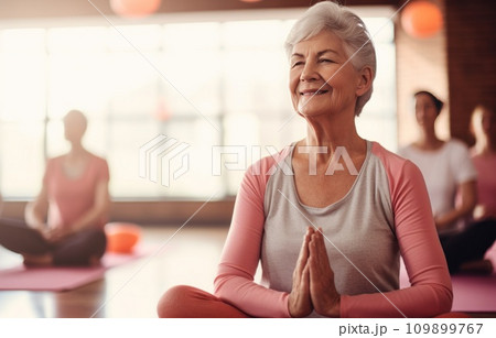an old lady yoga class 109899767