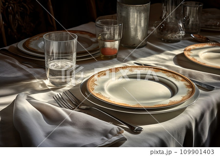 Table setting with flowers and decor in light colors 109901403