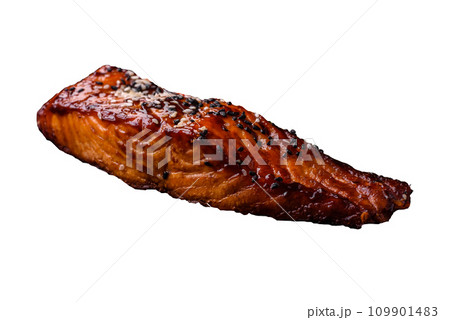 Delicious grilled red salmon fish with sauce, sesame seeds, spices and herbs 109901483