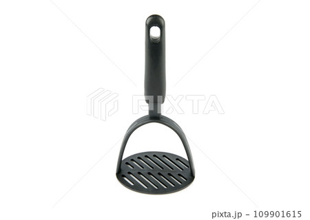 Puree masher isolated on white . Puree masher isolated on white . 109901615