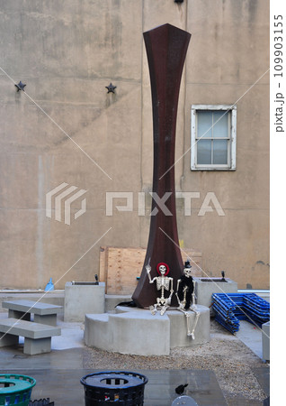 Two skeletons sitting on a rock in New York 109903155