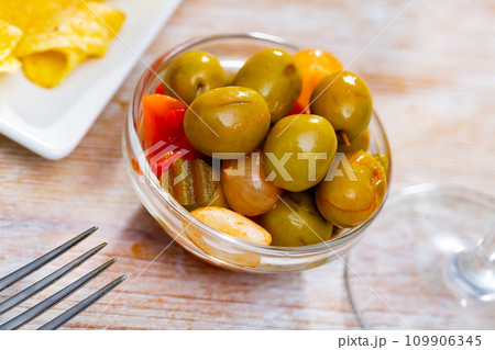 Image of assorted green olives 109906345