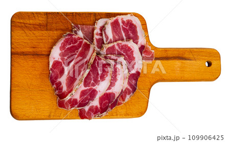 Delicious cut pieces dry cured pork neck. Traditional Spanish meat products Delicious cut pieces dry cured pork neck. Traditional Spanish meat products 109906425