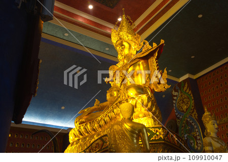 Phra Buddha Hiranrat His body was dressed in royal garb in the pose of bestowing blessings as the principal Buddha image. At Sacred Hall in Wat Tha Mai temple. Phra Buddha Hiranrat His body was dressed in royal garb in the pose of bestowing blessings as the principal Buddha image. At Sacred Hall in Wat Tha Mai temple. 109910047