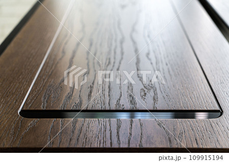 Mobile phone with wireless charger on table. Modern workplace accessory Mobile phone with wireless charger on table. Modern workplace accessory 109915194