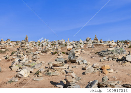 Stone pyramids assembled by visitors near Arctic Circle Center in Rana, Nordland, Norway Stone pyramids assembled by visitors near Arctic Circle Center in Rana, Nordland, Norway 109917018