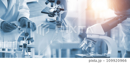 Double exposure microscope and Young woman scientific using equipment in the laboratory for research.Biotechnology,development,chemical,vaccine,Photo concept experimentation and research. 109920966