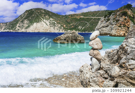 Scenic beaches of beautiful Cephalonia (Kefalonia) island - Agia Eleni with picturesque rocks. Greece , Ionian islands Scenic beaches of beautiful Cephalonia (Kefalonia) island - Agia Eleni with picturesque rocks. Greece , Ionian islands 109921244