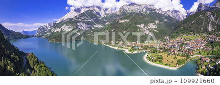 Most scenic mountain lakes in northern Italy - beautiful Molveno in Trento, Trentino Alto Adige region. panoramic aerial drone high angle view. 109921660