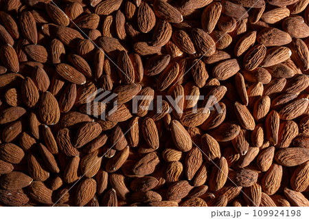 Scattered Almonds. Background from Almond Nuts Scattered Almonds. Background from Almond Nuts 109924198