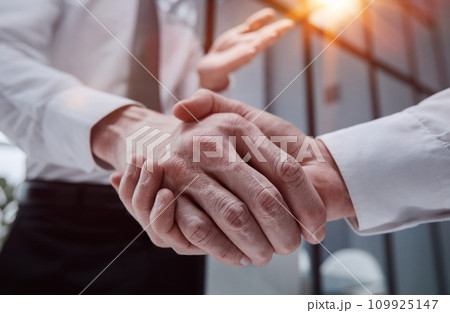 Business handshake of meeting or seminar room partner, business success and partnership concept Business handshake of meeting or seminar room partner, business success and partnership concept 109925147