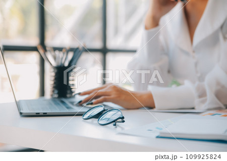 Business team collaboration discussing working analyzing with financial data and marketing growth report graph in team, presentation and brainstorming to strategy planning making profit of company. 109925824