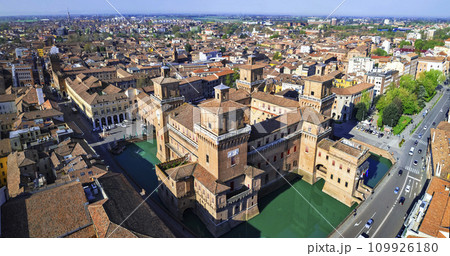 Ferrara - beautiful medieval town in Emilia Romagna Italy. aerial drone view of castle Estense in historic center. Ferrara - beautiful medieval town in Emilia Romagna Italy. aerial drone view of castle Estense in historic center. 109926180