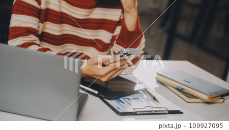 Finance manager meeting discussing company growth project success financial statistics, professional investor working start up project for strategy plan with document, laptop and digital tablet. 109927095