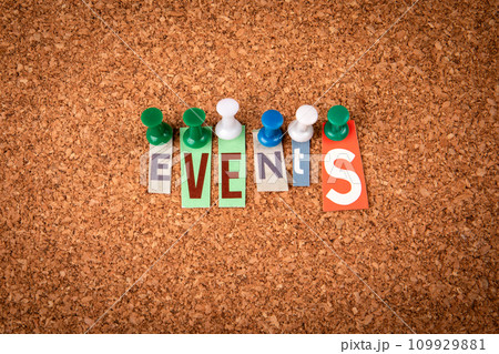EVENTS. Letters pinned to a cork notice board 109929881