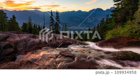 River down the waterfall in Canadian Mountain Landscape. Sunrise Sky. 109934958