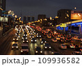 Moscow March 18 2021, driving a car in the night city of Moscow, traffic in the metropolis at night, lighting night roads in a big city, selective focus, blurred background tinting glare from 109936582