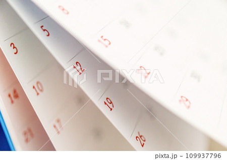 Calendar page flipping sheet close up on office table background business schedule planning appointment meeting concept 109937796
