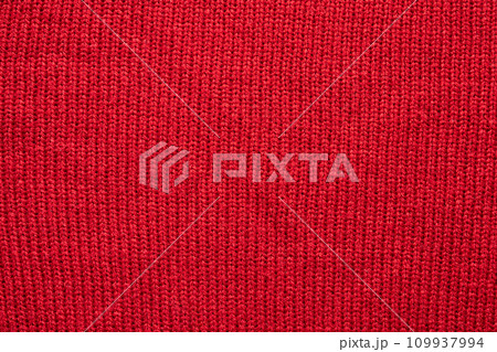 Red knitted wool texture background Red knitted wool texture background 109937994