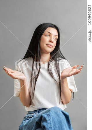 Portrait of a young girl who looks sad. 109940625