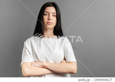 Portrait of a young girl who looks sad. 109940627