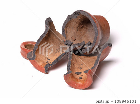 Old brown pottery, isolated on white Old brown pottery, isolated on white 109946101