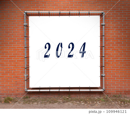 Large advertisement on a red brick wall Large advertisement on a red brick wall 109946121