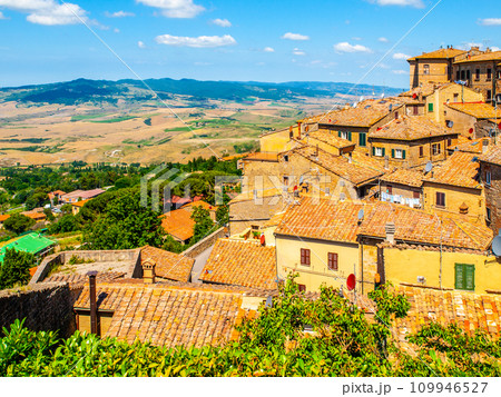 Panoramic view of Volterra - medieval Tuscan town with old houses, towers and churches, Tuscany, Italy. Panoramic view of Volterra - medieval Tuscan town with old houses, towers and churches, Tuscany, Italy. 109946527