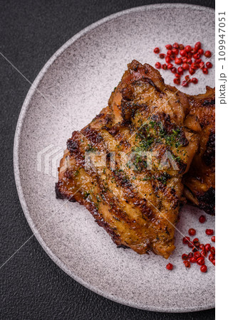 Delicious juicy beef or chicken steak with salt, spices and herbs Delicious juicy beef or chicken steak with salt, spices and herbs 109947051