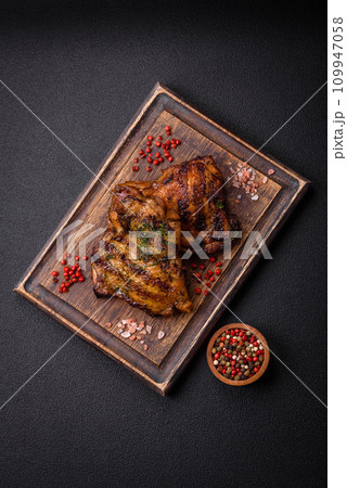 Delicious juicy beef or chicken steak with salt, spices and herbs 109947058